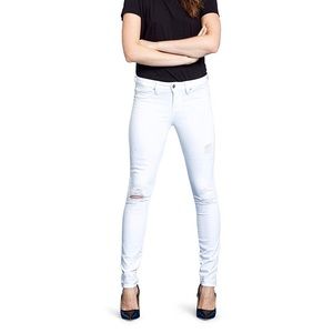 Mid-rise white skinny jeans